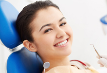 Young woman having her dental checkup