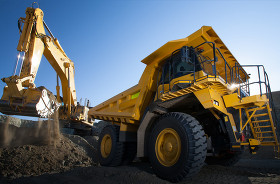 A huge truck at a construction site. 