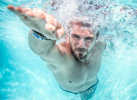 Man swimming in a pool