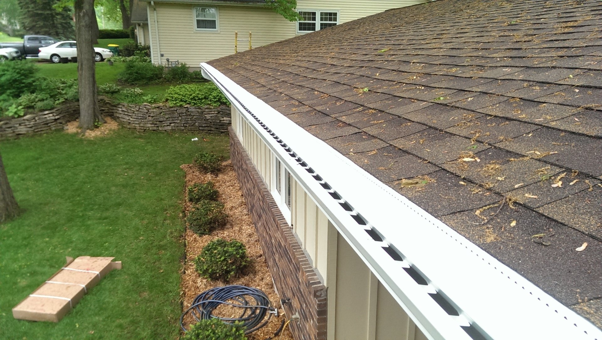 White Gutters, 3x4 Downspout, and LeafX Covers