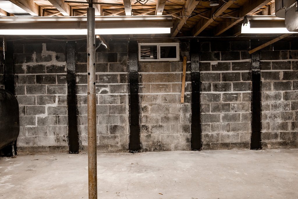 Bowed Concrete/Cinder Block Wall Stabilization Repair